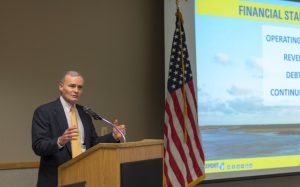 Image of Brian Taylor delivering a speech, the State of the Port Address.