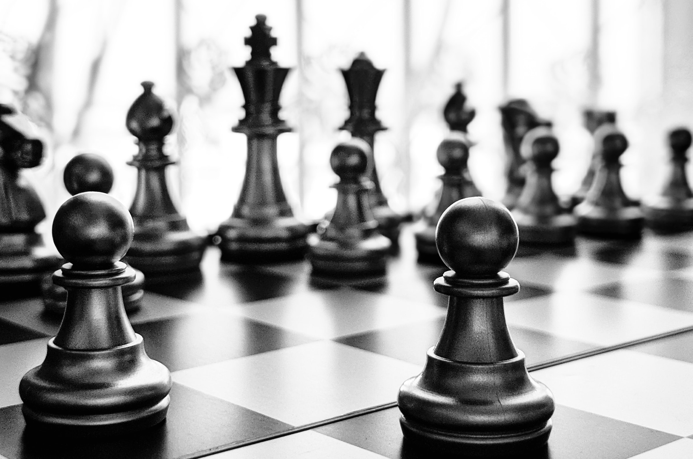 Black and white image of a chess game.