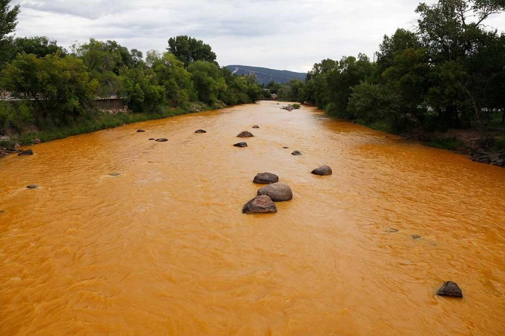 Photo of Las Animas River turned orange by toxic spill