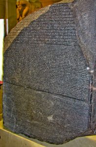 A photograph of the Rosetta Stone, which was used to translate Egyptian hieroglyphics into Ancient Greek.